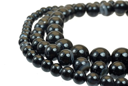 Black onyx beaded necklace close-up.