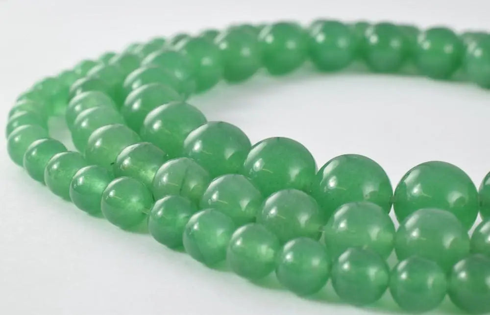 Green jade bead necklace close-up.