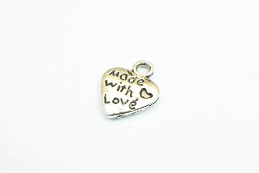 "Silver heart charm with 'Made with Love' engraving"