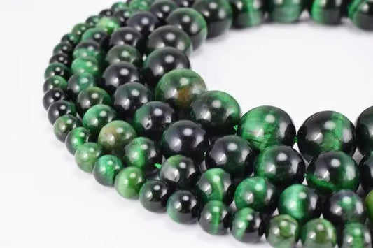 Green tiger eye gemstone beads in graduated sizes, jewelry making supplies.