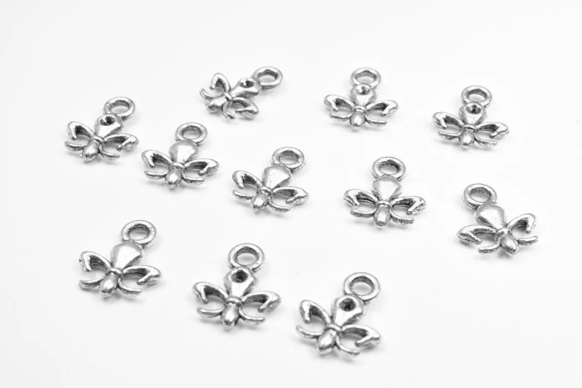 22 PCs Silver Alloy Pendant Charm Fleur De Lis Football Saints Size 14x11.5mm Jump Ring 2mm, 2.5mm Thickness For Jewelry Making - BeadsFindingDepot