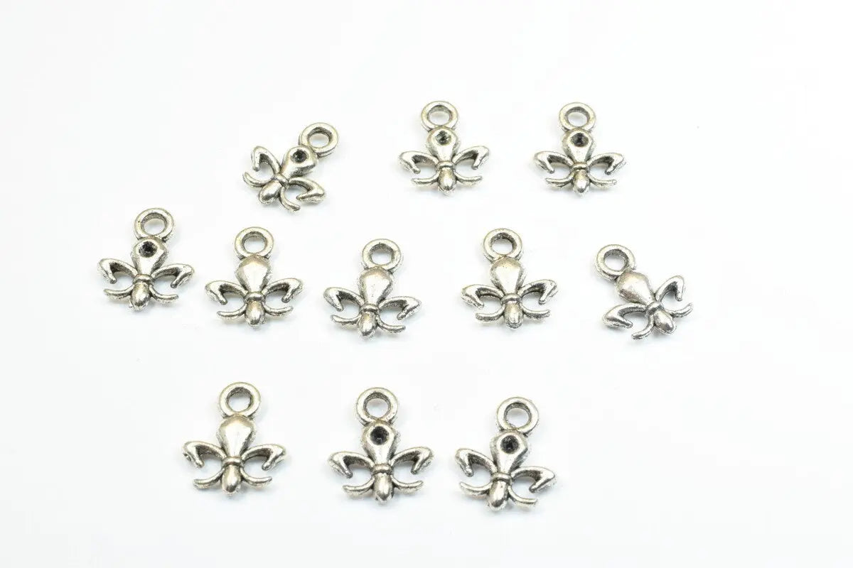 22 PCs Silver Alloy Pendant Charm Fleur De Lis Football Saints Size 14x11.5mm Jump Ring 2mm, 2.5mm Thickness For Jewelry Making - BeadsFindingDepot