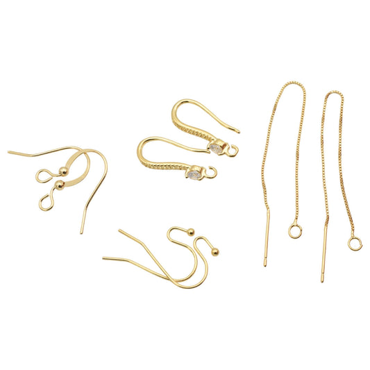 Gold earring hooks set with various styles for jewelry making.