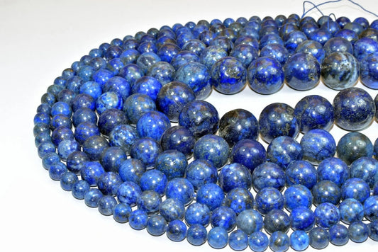 Lapis lazuli gemstone beads in graduated sizes.