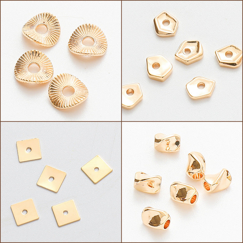 Gold geometric metal beads in assorted shapes for jewelry making.