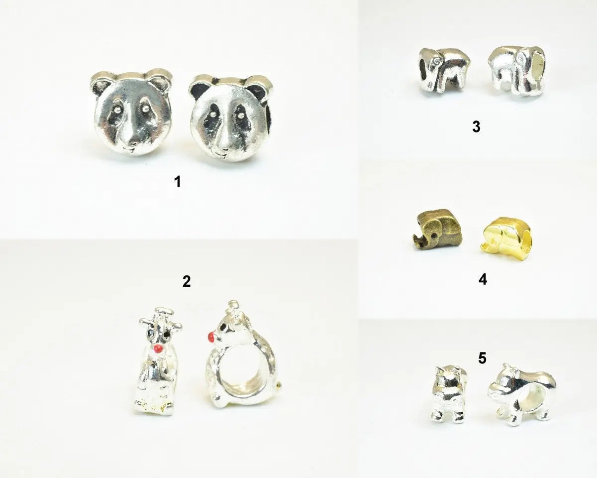 Silver animal charm beads, including panda, cow, elephant, and hippo designs, for jewelry making.