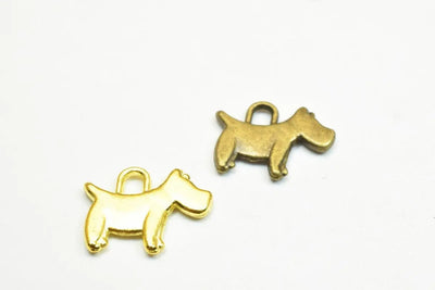 "Gold and bronze dog-shaped charms for jewelry making"