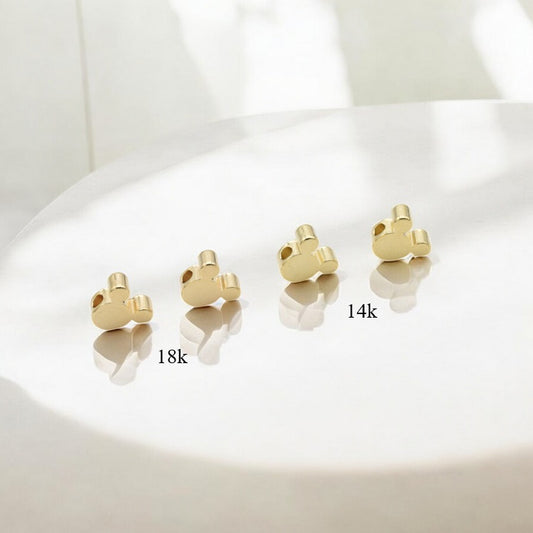 Alt text: "Heart-shaped gold stud earrings in 14k and 18k"