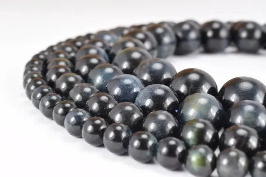 "Black obsidian bead necklace with glossy finish"