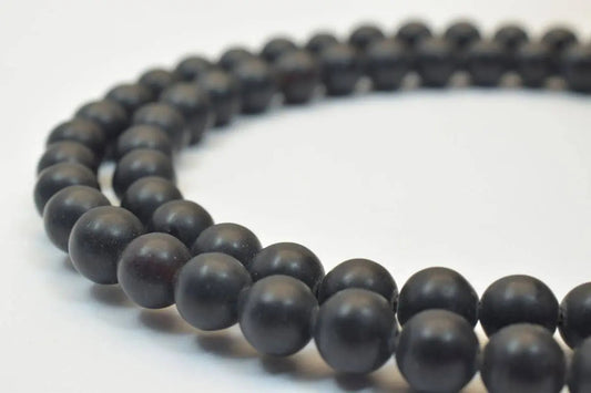 Black onyx bead necklace close-up.