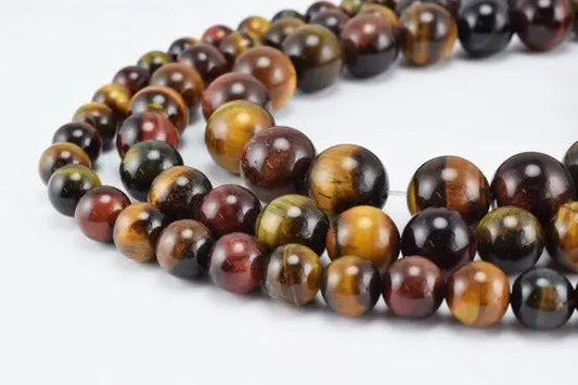 Tiger eye gemstone bead necklace with polished multicolor round beads.