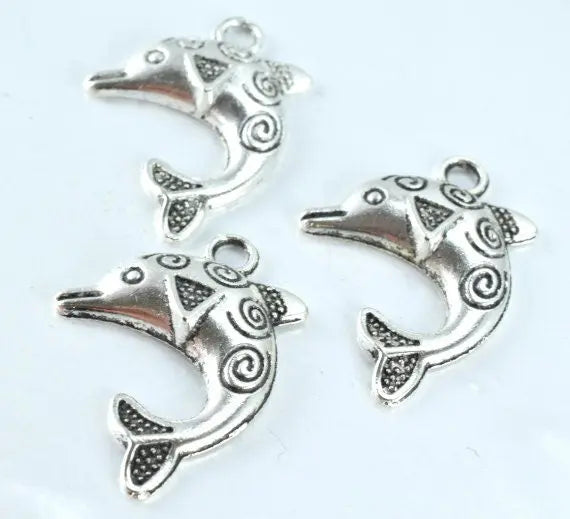 31x23mm Decorative Textured Antique Silver Dolphin Pendant Charm, 8pcs/Pk,3mm hole opening,2mm thickness - BeadsFindingDepot