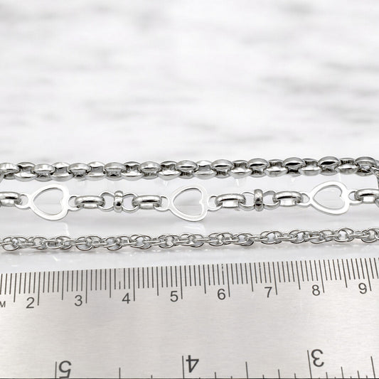 Silver heart link chain necklace with ruler for size reference