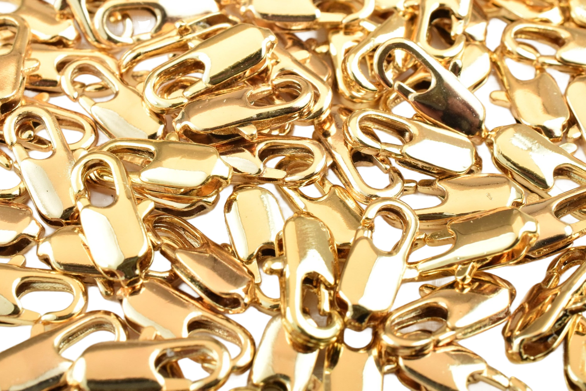 Gold lobster claw clasps for jewelry making.