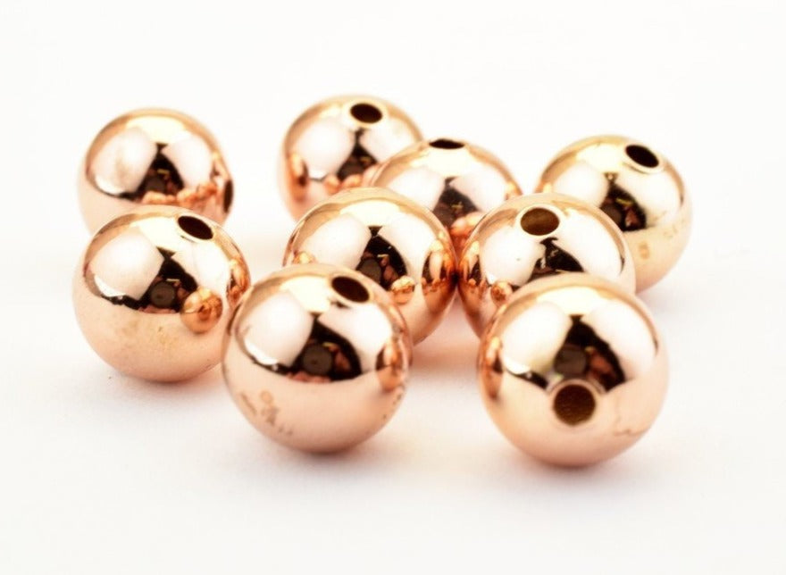 "Shiny rose gold round bead spacers for jewelry making"