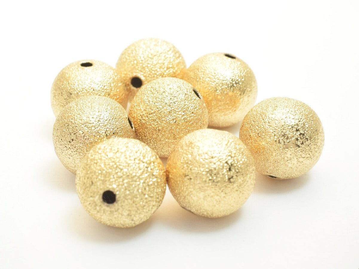 "Shimmering gold textured round beads for jewelry making"