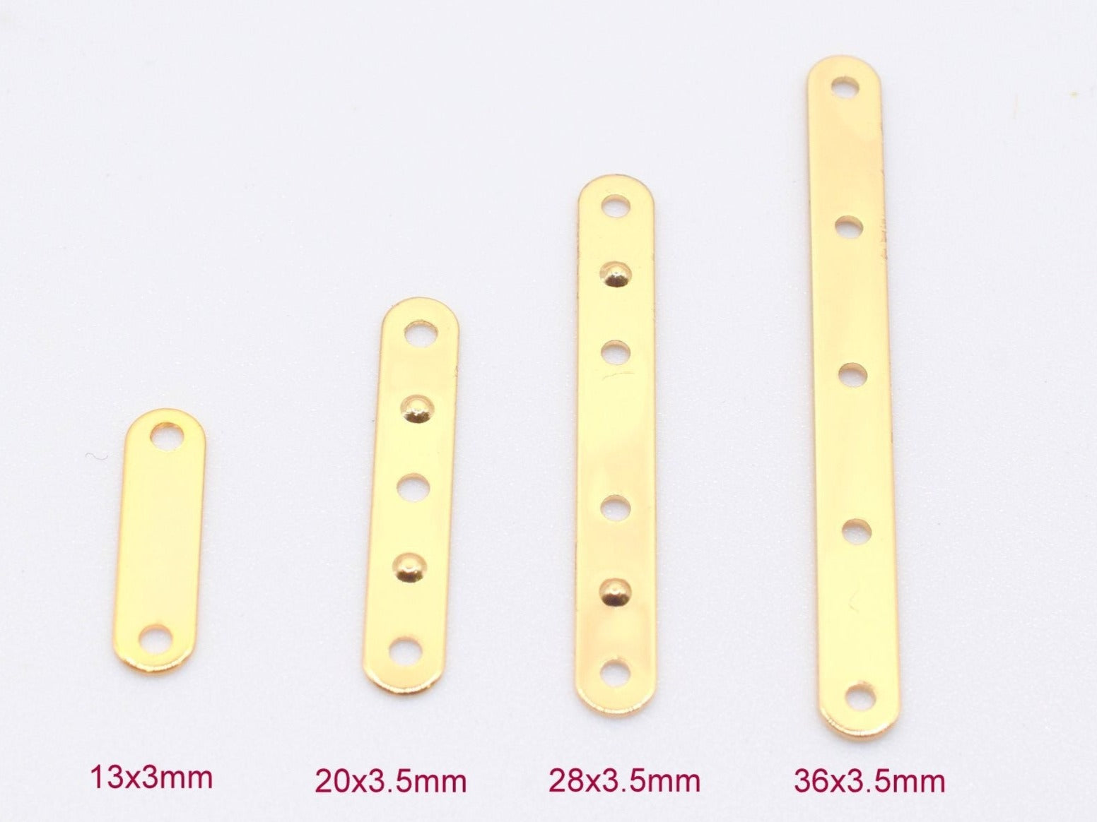 Four gold-colored metal flat bar connectors with pre-drilled holes, sizes 13x3mm, 20x3.5mm, 28x3.5mm, 36x3.5mm.