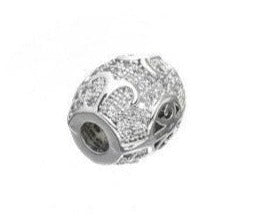 Silver charm bead with intricate swirl pattern and sparkling crystals.