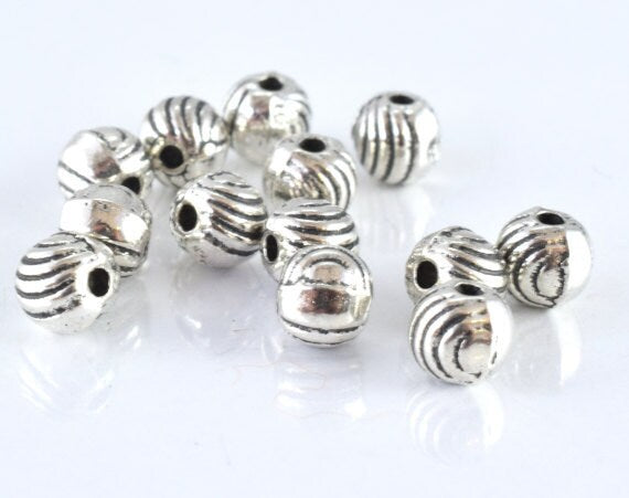 5mm Antique Ridge Antique Silver Round Bead, Sold by 1 pack of 40pcs, 1.5mm hole opening, 17grams/pk