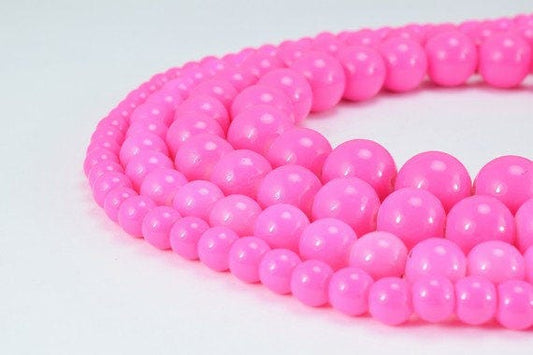 "Pink beaded necklace with multi-strand design"