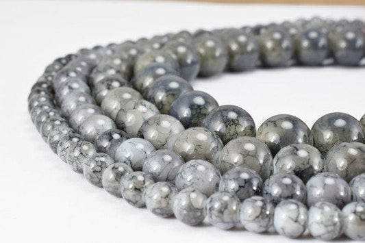 "Grey marble gemstone beads in graduated sizes for jewelry making"