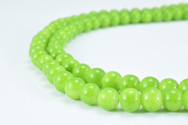 Green jade bead necklace strands.