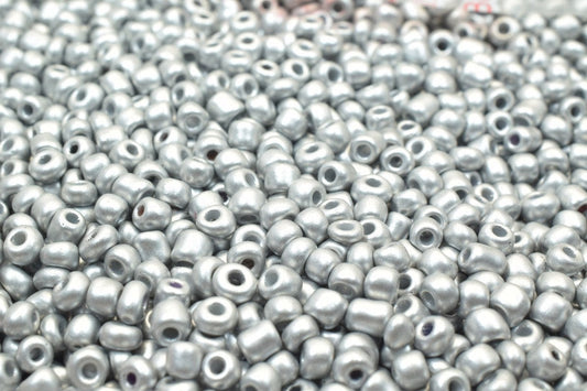 Shiny silver seed beads for jewelry making.