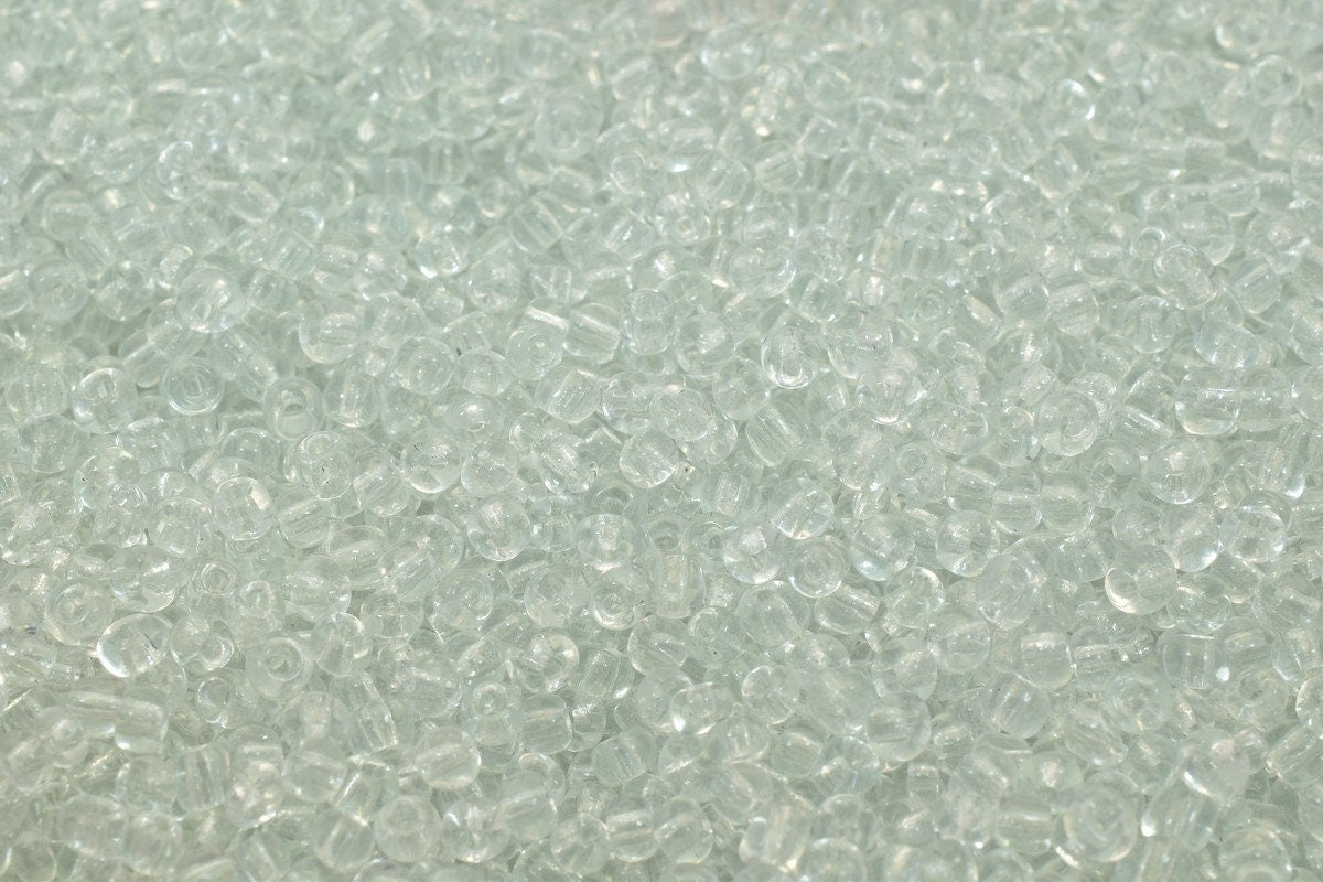 Clear glass seed beads for jewelry making.