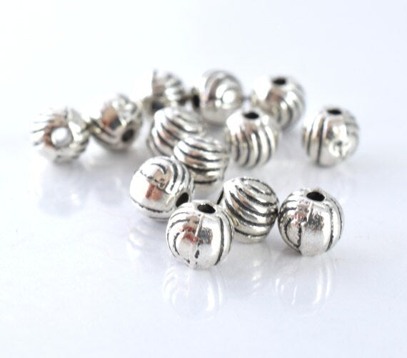 5mm Antique Ridge Antique Silver Round Bead, Sold by 1 pack of 40pcs, 1.5mm hole opening, 17grams/pk